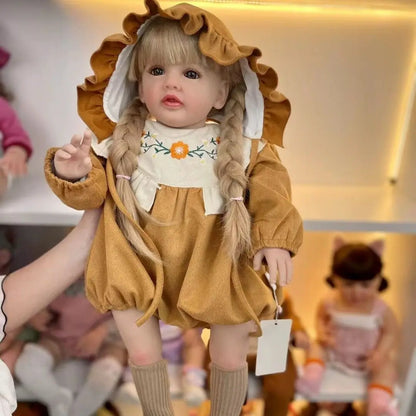 Bambola reborn Betty con lunghi capelli biondi 60cm di lunghezza e corpo in morbido cotone