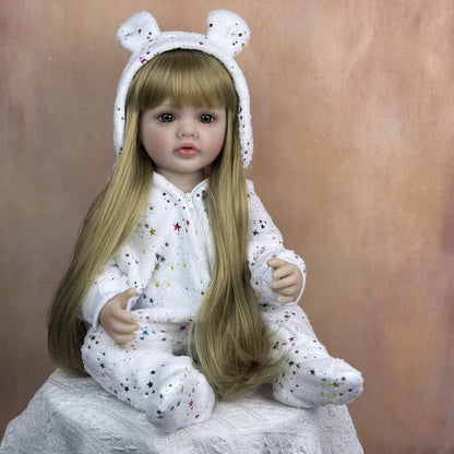 Bambina reborn Betty 55 cm occhi aperti lunghi capelli biondi con tutina a stelle