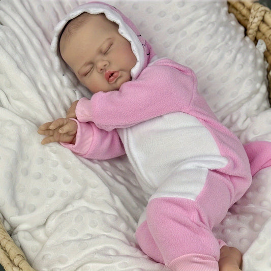 Bambola reborn di 50 cm con corpo in tessuto morbido modello Pickle addormentata con vestito rosa