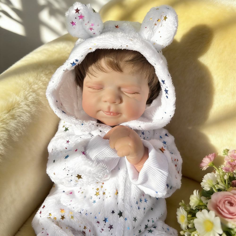 Pascale bambina reborn realistica con occhi chiusi alta 48 cm con tutina a stelle