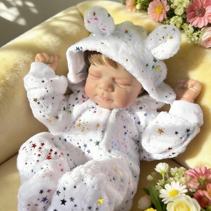 Pascale bambina reborn realistica con occhi chiusi alta 48 cm con tutina a stelle