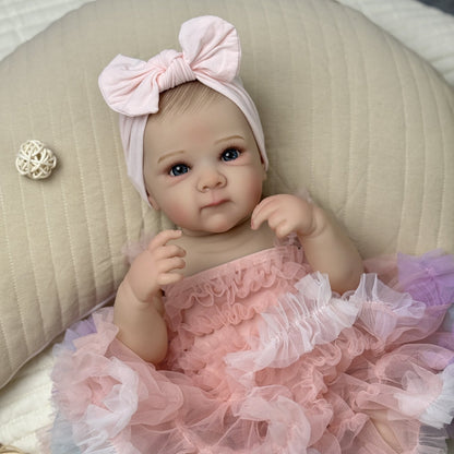Bambina rinata Bettie con occhi aperti 48 cm in abito rosa