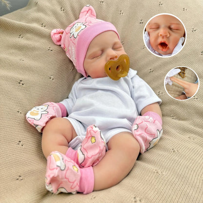 Bambina Reborn Loulou da 45 cm in silicone pieno ed elastico (occhi chiusi) con completino bianco