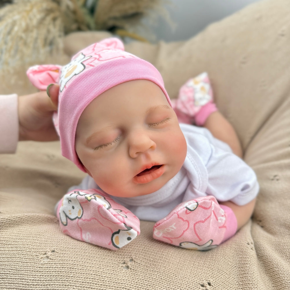 Bambina Reborn Loulou da 45 cm in silicone pieno ed elastico (occhi chiusi) con completino bianco