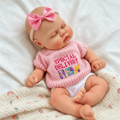 Bambola reborn realistica in silicone da 30 cm modello Pickle con maglione rosa