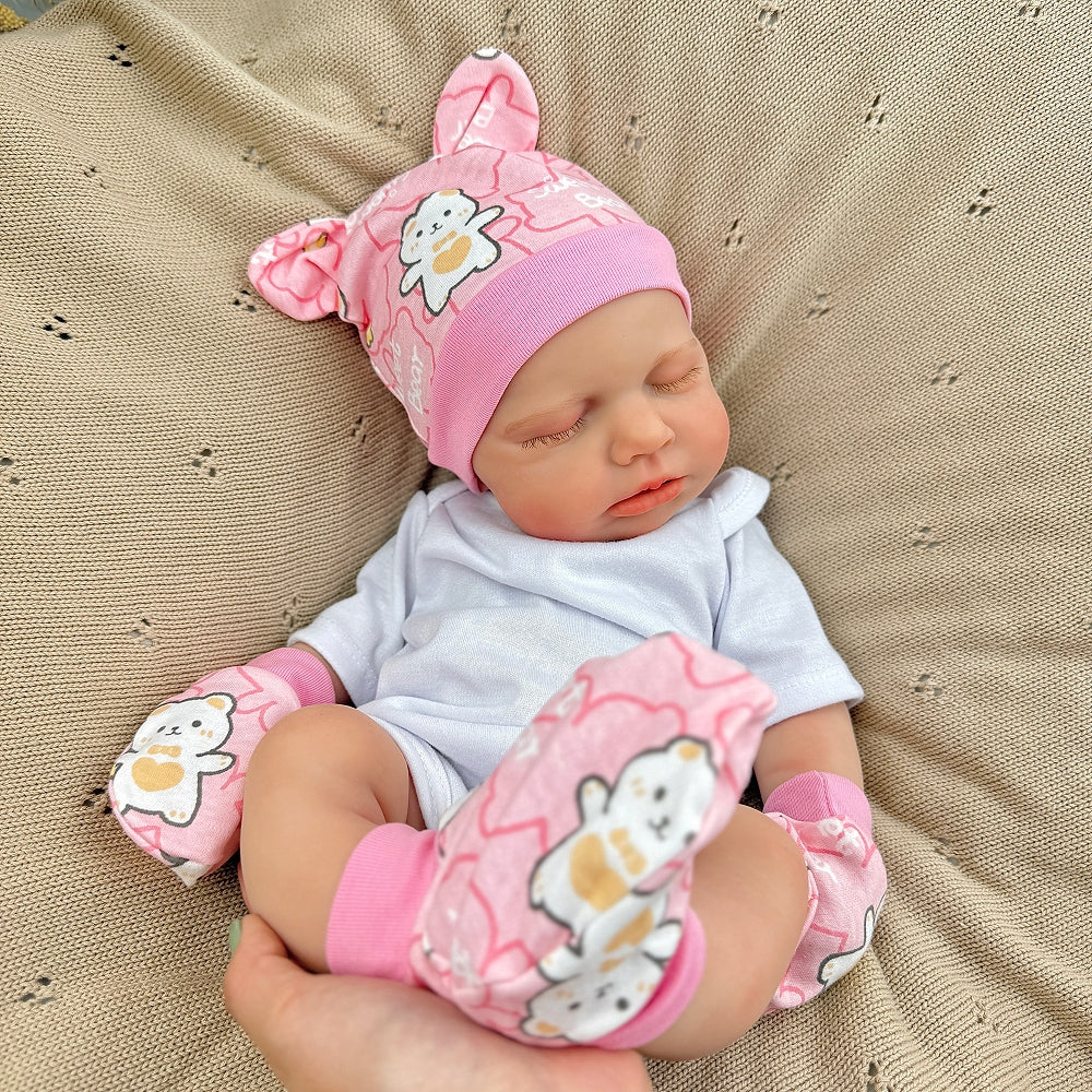 Bambina Reborn Loulou da 45 cm in silicone pieno ed elastico (occhi chiusi) con completino bianco