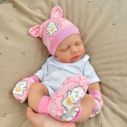 Bambina Reborn Loulou da 45 cm in silicone pieno ed elastico (occhi chiusi) con completino bianco