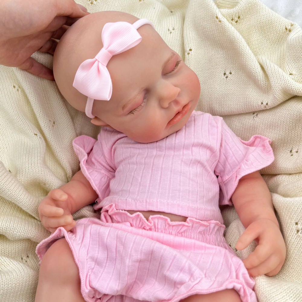 Bambina Reborn Loulou da 45 cm in silicone pieno ed elastico (occhi chiusi) con completino rosa