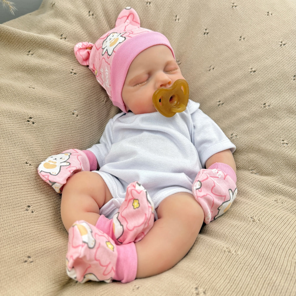 Bambina Reborn Loulou da 45 cm in silicone pieno ed elastico (occhi chiusi) con completino bianco