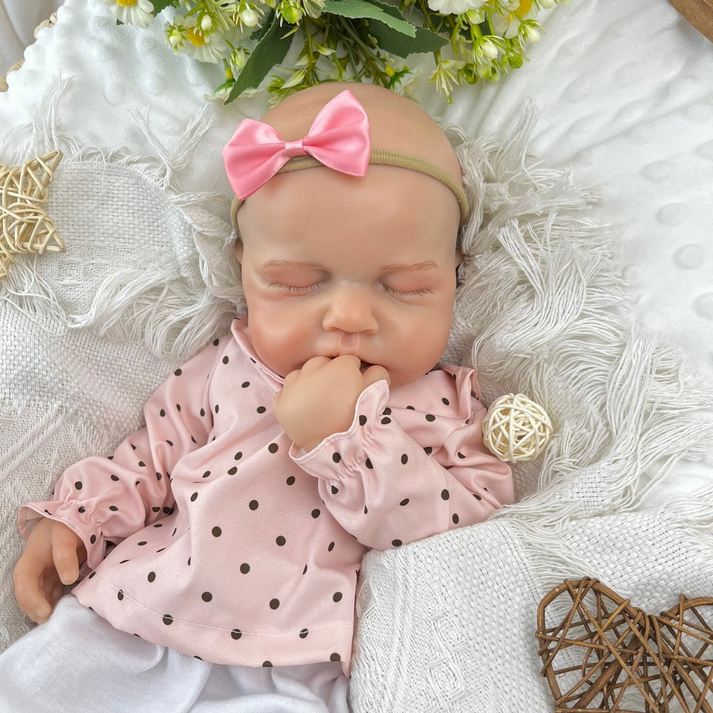 Bambina reborn Loulou addormentata in silicone estensibile alta 45 cm con vestitino a pois rosa