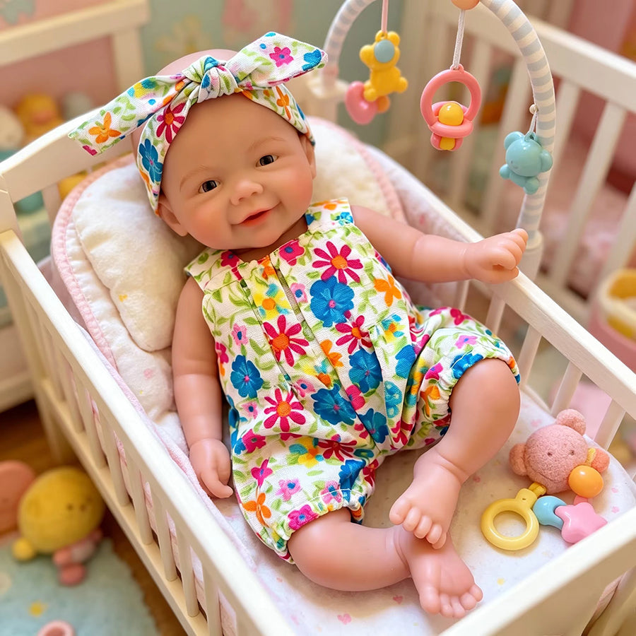 Mini bambola Reborn Vivienne da 20 cm in silicone pieno con tutina a fiori