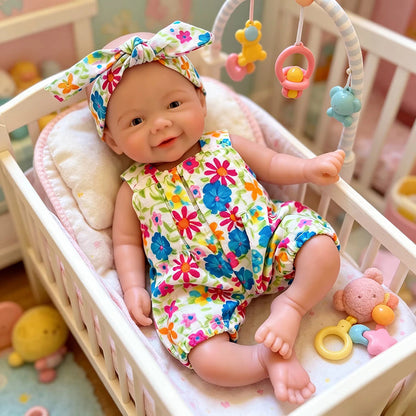 Mini bambola Reborn Vivienne da 20 cm in silicone pieno con tutina a fiori