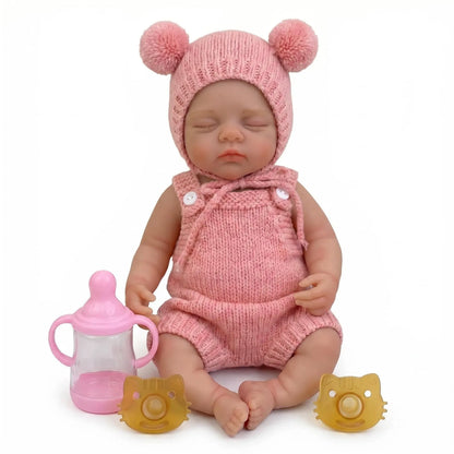 Bambola reborn Irys da 30cm interamente in silicone bambina con abiti rosa