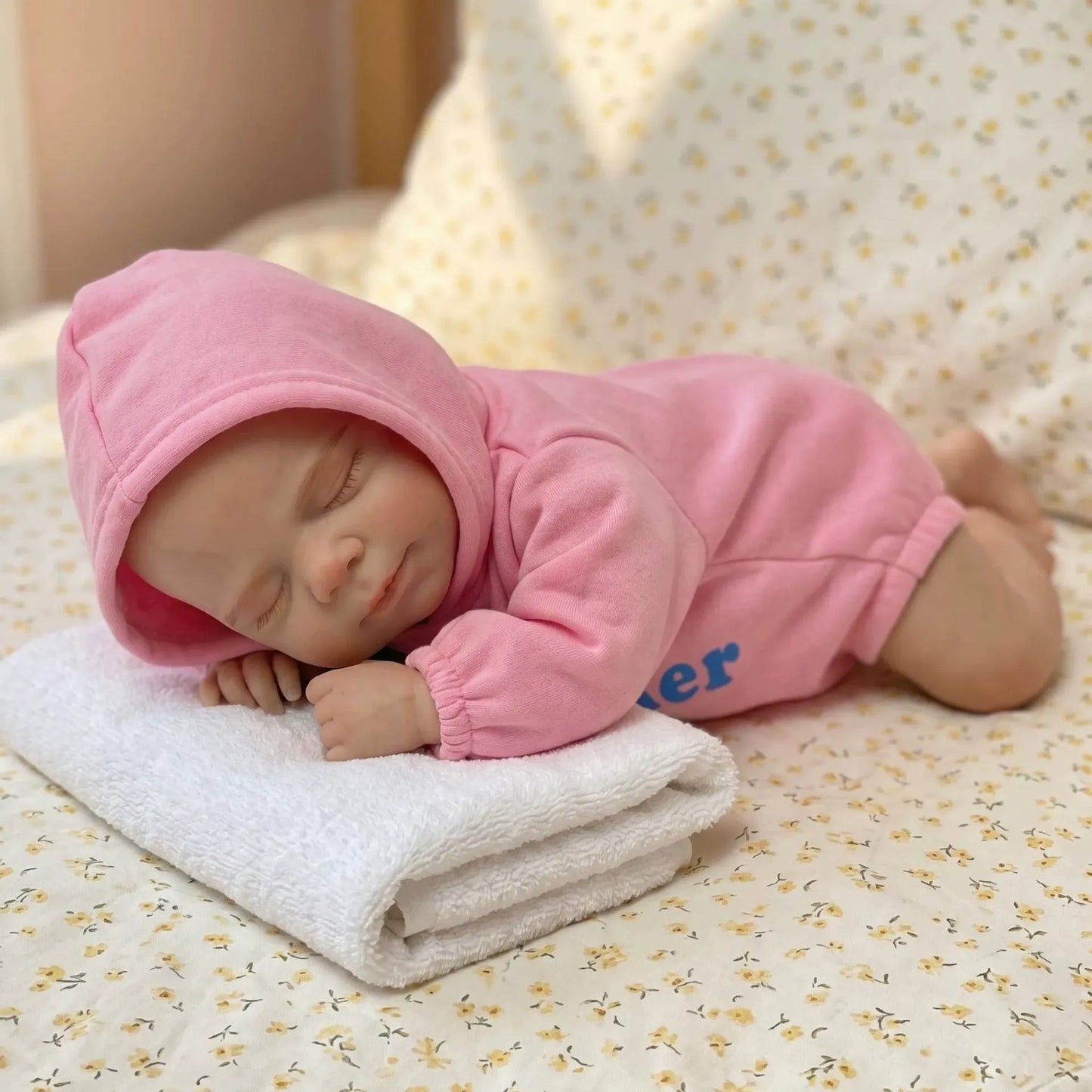 Bambola reborn Pascale da 30cm interamente in silicone con vestitino rosa