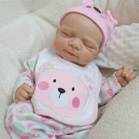 Bambola reborn Pascale da 45cm in morbido silicone vestita con un orsetto rosa