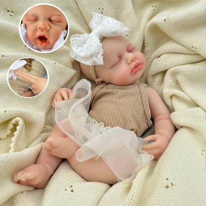 Bambola reborn Loulou 30 cm in silicone con occhi chiusi realistica vestita con un abito color caffè