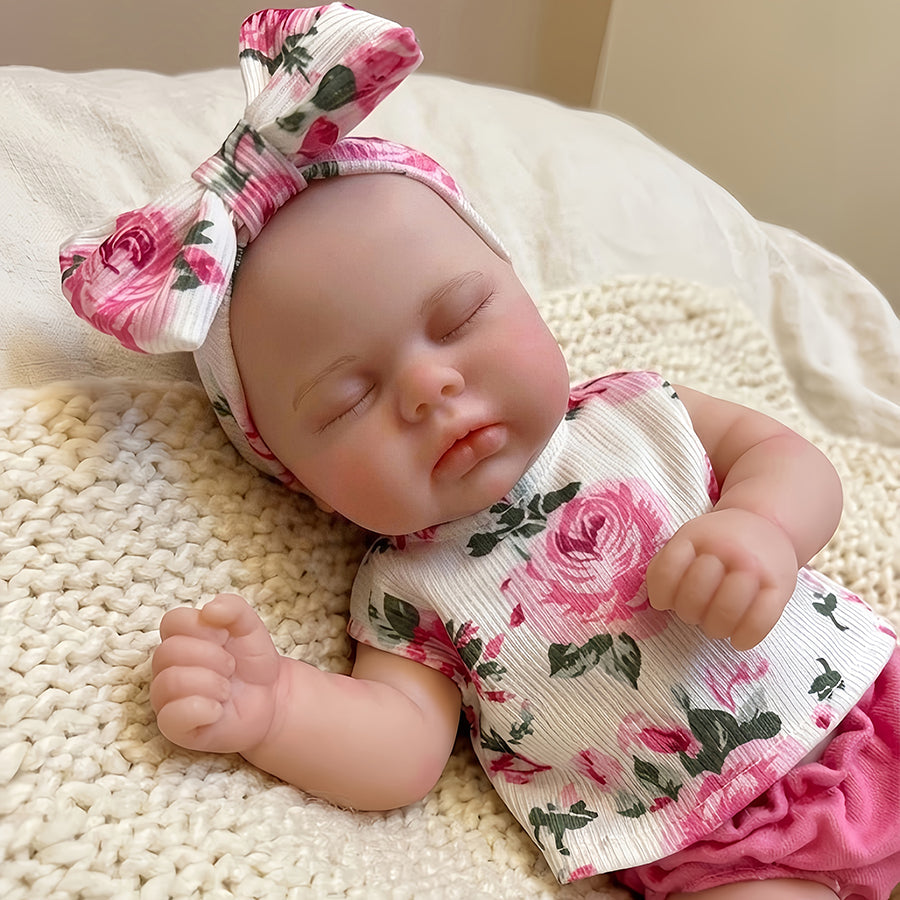 Bambola Reborn femminile Pickle da 30 cm in silicone pieno occhi chiusi con completo a fiori
